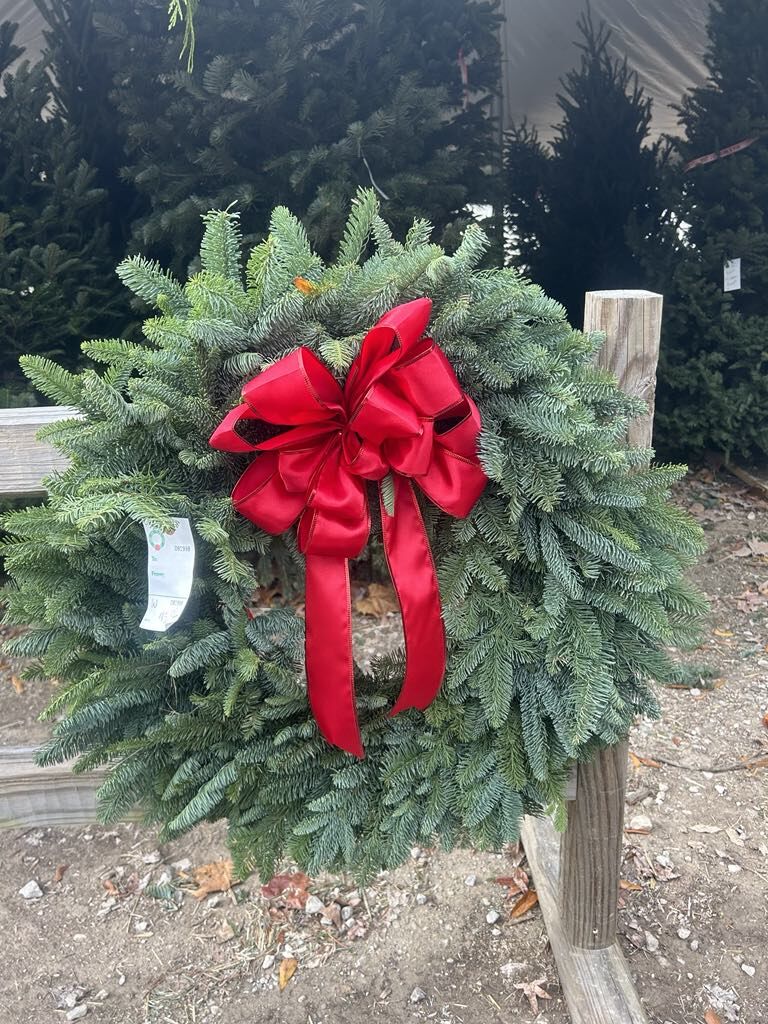 A fresh wreath with a red bow